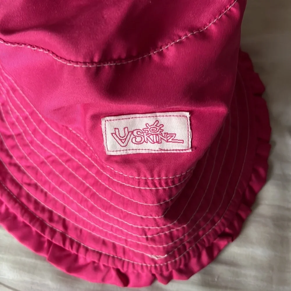 UV Skinz kids fuchsia and blue bucket hats in size 6 and 7